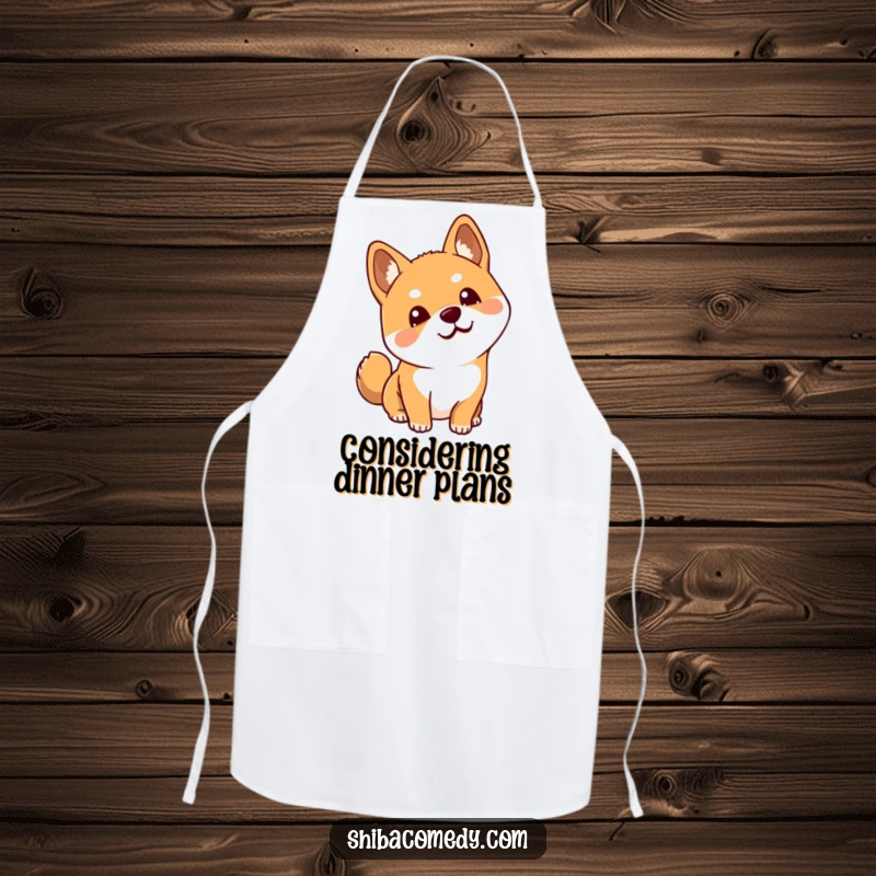 Funny Shiba Inu apron depicting a dog tilting its head with perked ears, perfect for adding humor to cooking and kitchen tasks.