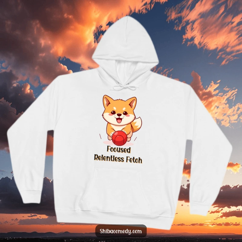 Funny Shiba Inu hoodie showing a determined dog intensely chasing a red ball, designed for humor and focus.