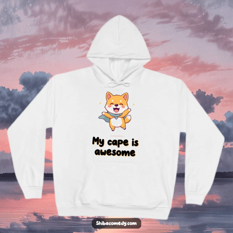 Funny Shiba Inu dog wearing a small cape, captured mid-jump with joy, printed on a cozy hoodie for heroic warmth and smiles.
