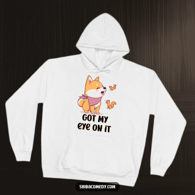 Funny hoodie with a Shiba Inu dog in a bandana, intensely barking at a squirrel, perfect for cozying up with a laugh.