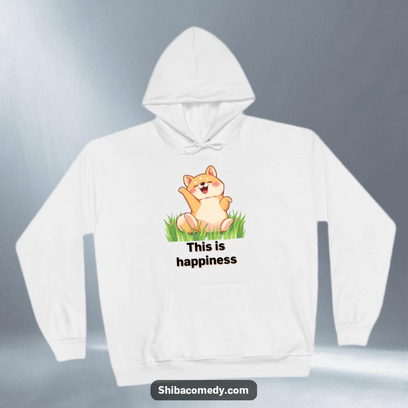 Funny Shiba Inu hoodie, a delighted dog rolls on its back in a field of grass, cozy humorous sweatshirt.