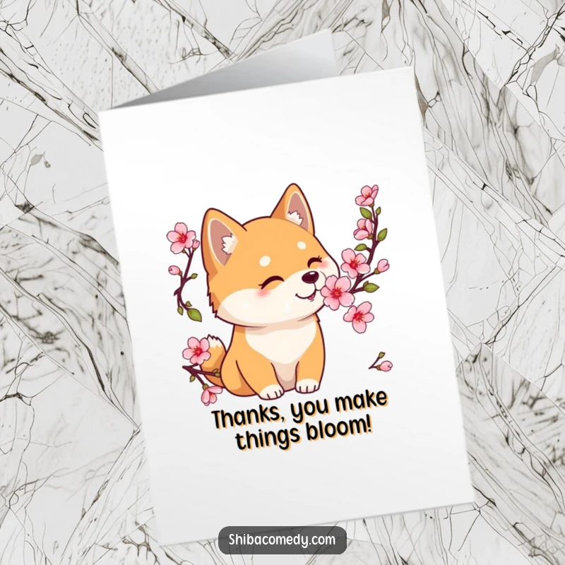 Funny Free Printable Thank You Card featuring a gentle Shiba Inu sniffing a cherry blossom, conveying sincere and sweet gratitude.