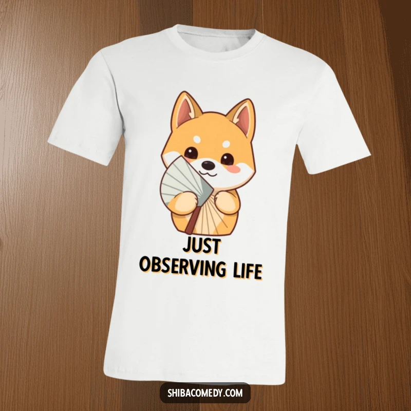 Funny curious Shiba Inu dog peeking its head out from behind a rotating fan, depicted on a T-shirt for a playful surprise.