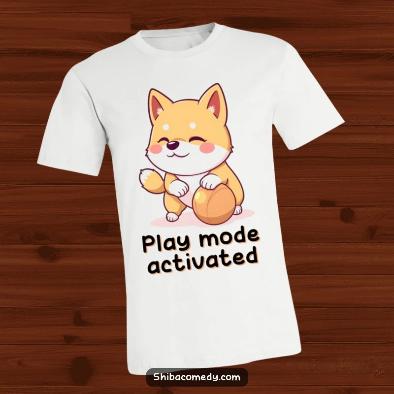 Funny Shiba Inu t-shirt featuring a playful dog with a mischievous glint nudging a rolling toy, full of energy.