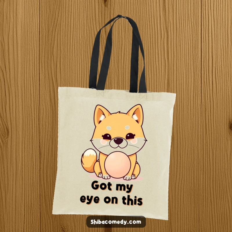 Funny Shiba Inu tote bag showing a dog with intense focus balancing a ball on its nose, a unique and humorous accessory.