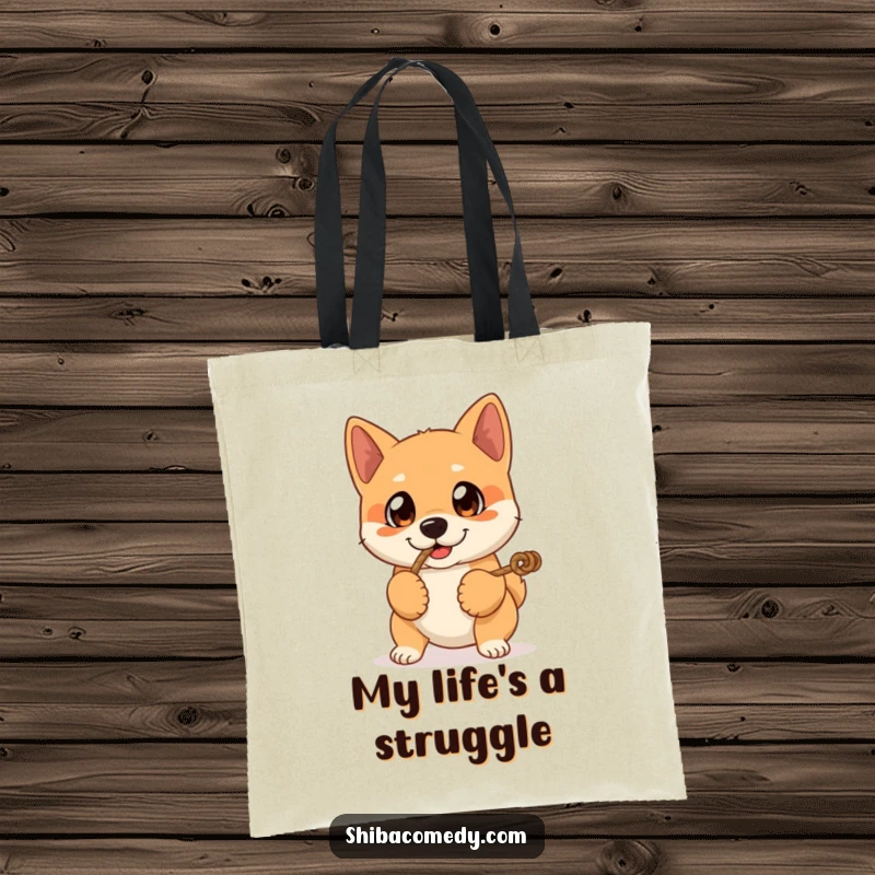 Funny tote bag featuring a Shiba Inu dog with big eyes playing tug-of-war, perfect for carrying items with a playful vibe.